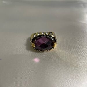 Elegant Gold and Purple Gemstone Ring